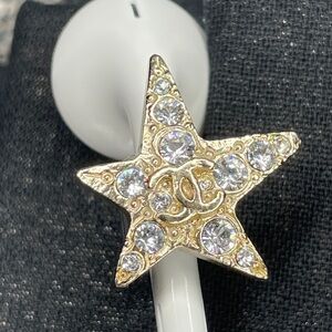 Chanel Gold Star Clip on AirPods or earbuds